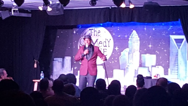 Comedian performing at The Comedy Zone in Charlotte, North Carolina