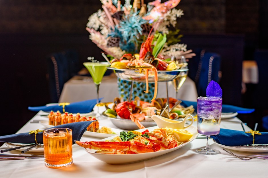 Elaborate seafood tower with cocktails at Sea Grill in Charlotte, NC