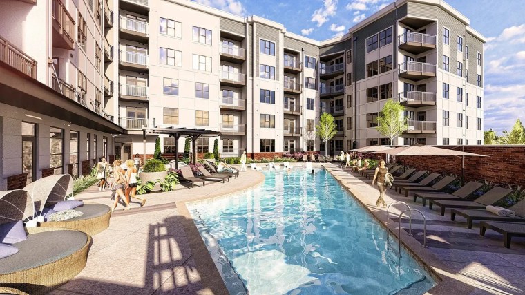Pool and exterior image of apartments at MAA Plaza Midwood