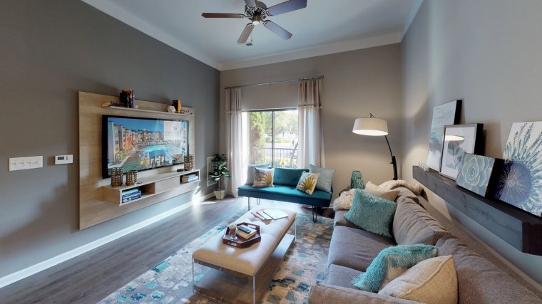 Living room at Celsius Apartments on Perimeter Station by Northlake Mall in Charlotte, NC