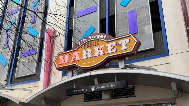 Exterior colorful signs at The Market at 7th Street in Uptown Charlotte, NC